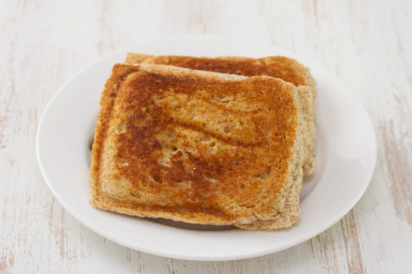 Sandwichs sur plaque blanche — Photo
