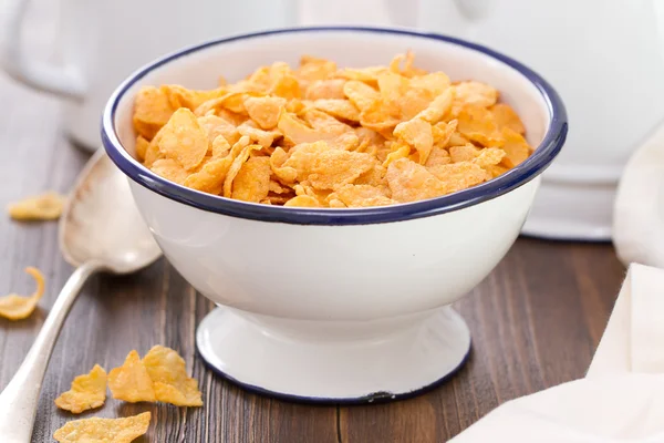 Corn flakes in white bowl — Stock Photo, Image