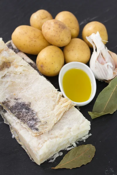 Salted codfish with potato, olive oil and garlic — Stock Photo, Image