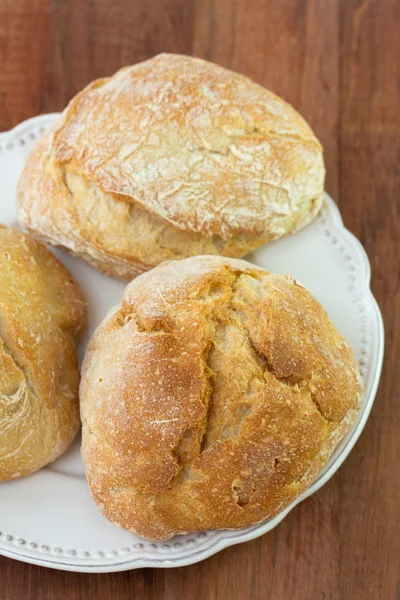 Bread on white dish — Stock Photo, Image