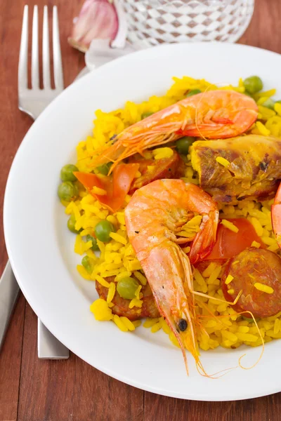 Paella on white plate — Stock Photo, Image