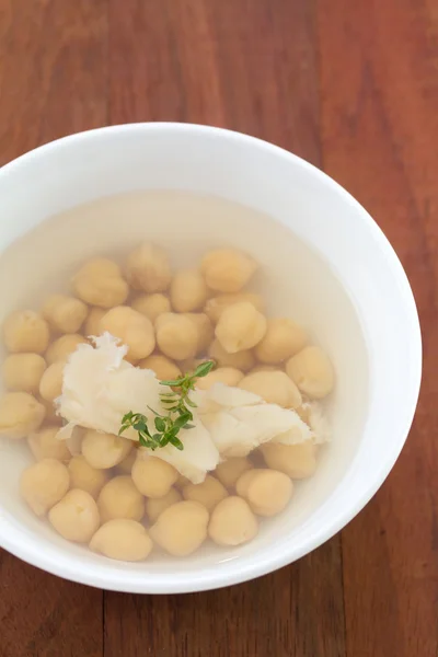 Soup with chick-pea in bowl