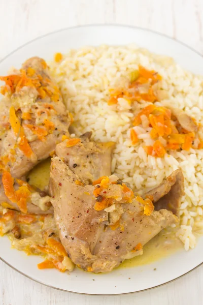 Rabbit with carrot and rice on plate — Stock Photo, Image