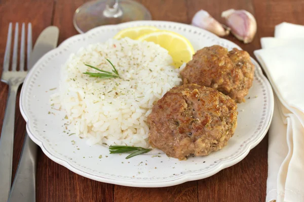 Meatballs with boiled rice — Stock Photo, Image