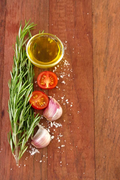 Rosemary with tomato, oil — Stock Photo, Image