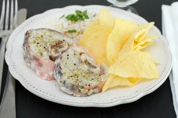 Boiled fish with rice and chips — Stock Photo, Image