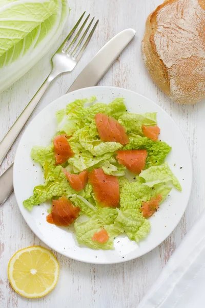 Salad with smoked salmon on white plate — Stock Photo, Image