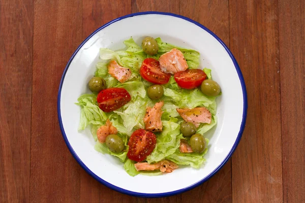 Salad with fish on plate — Stock Photo, Image