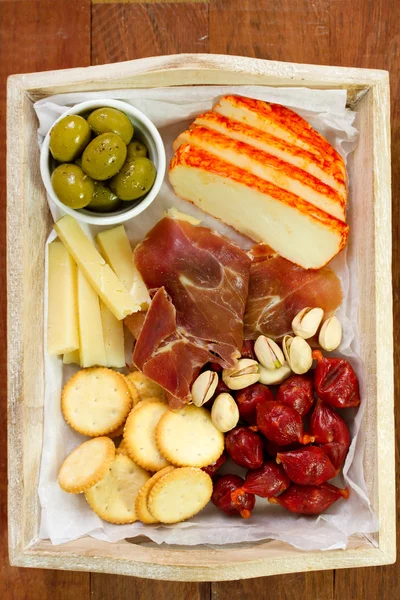 Cheese with olives, cookies and meat — Stock Photo, Image