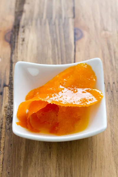 Orange skin in bowl — Stock Photo, Image