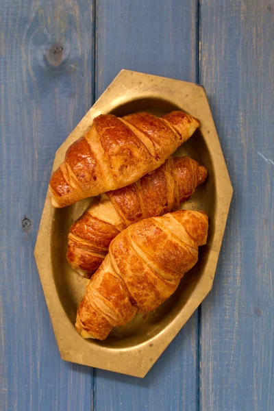 Croissants in dish — Stock Photo, Image