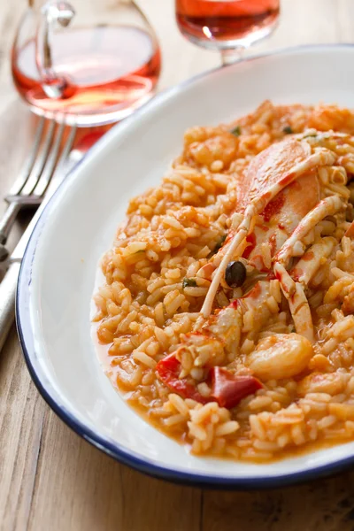 Rice with seafood on white dish — Stock Photo, Image