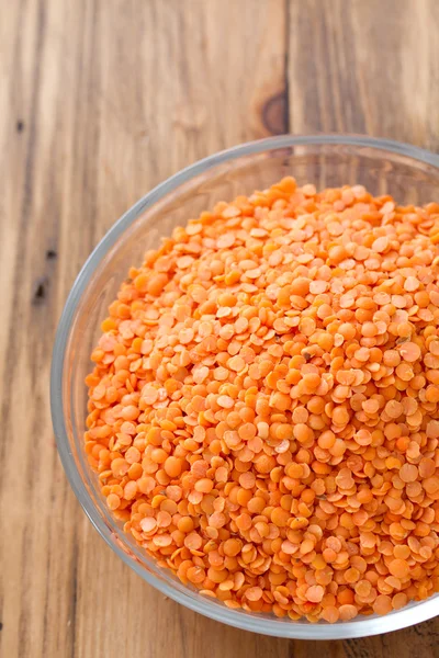 Dry lentil on plate — Stock Photo, Image