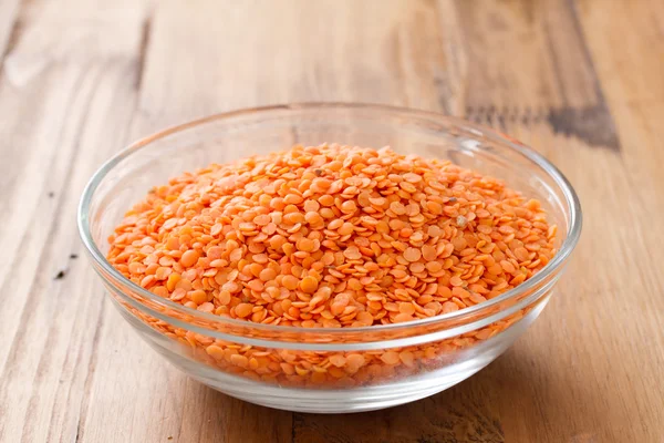 Dry lentil on plate — Stock Photo, Image