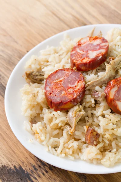 Duck rice with sausages on plate — Stock Photo, Image