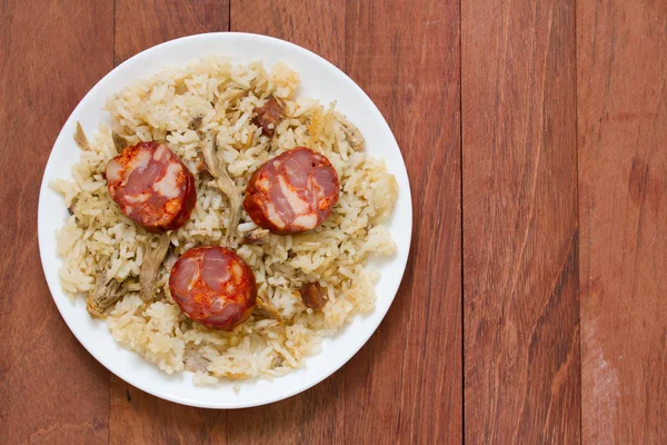 Duck rice with sausages on plate — Stock Photo, Image