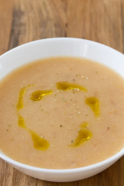 Vegetable soup with oil in white bowl — Stock Photo, Image