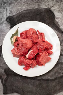 Fresh beef cut on white plate