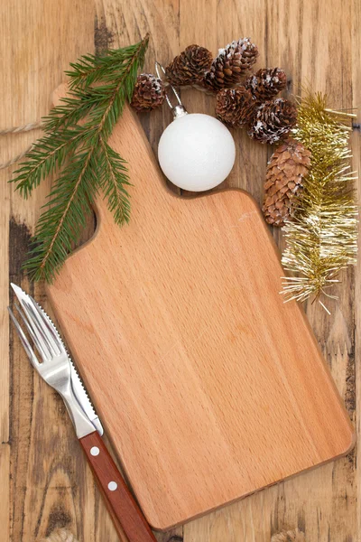 圣诞节木板以刀棕色木制背景 — 图库照片