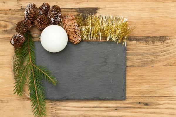 Black board with Christmas decoration — Stock Photo, Image