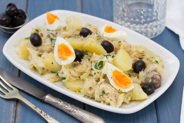 Traditional portuguese dish with codfish — Stock Photo, Image