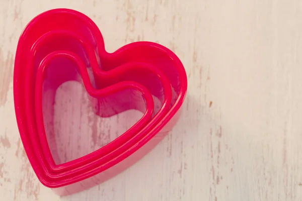 Hearts on white wooden background — Stock Photo, Image