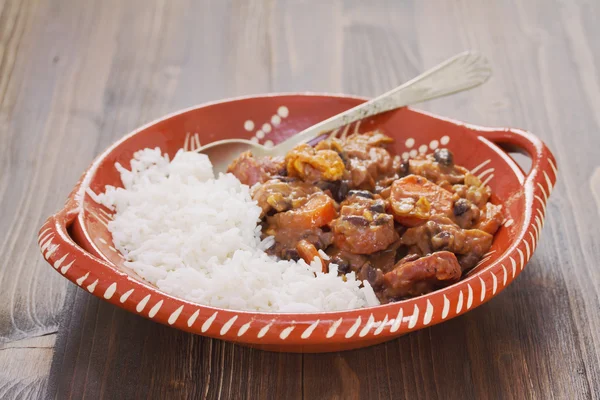 Typical portuguese dish feijoada with rice in ceramic bowl — Stock Photo, Image