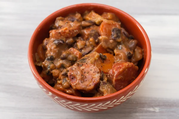Typical portuguese dish feijoada in ceramic bowl — Stock Image Typical portuguese dish feijoada in ceramic bowl Stock Photo