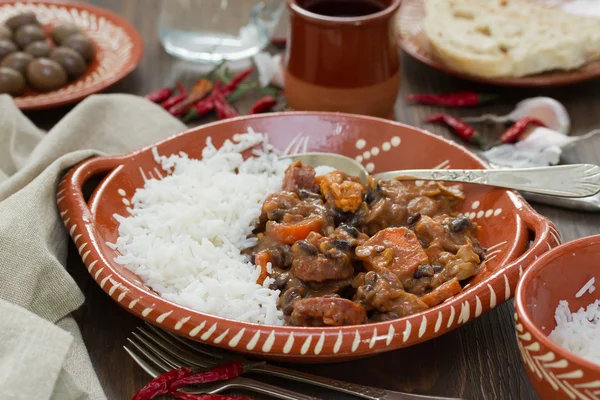 Typical portuguese dish feijoada with rice in ceramic bowl — Stock Photo, Image