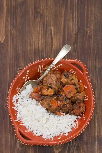 Typical portuguese dish feijoada with rice in ceramic bowl — Stock Photo, Image