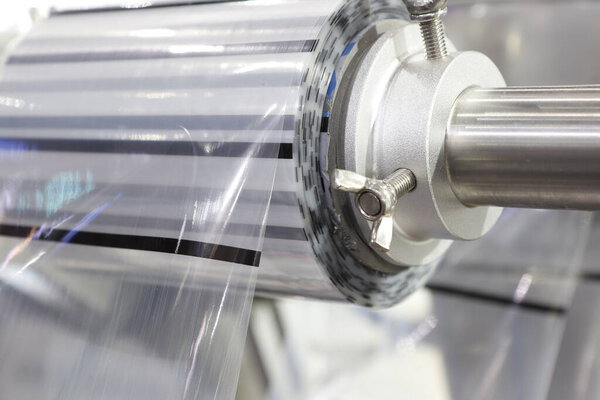 рулон пластика в пищевой промышленности упаковки; инженерный фон