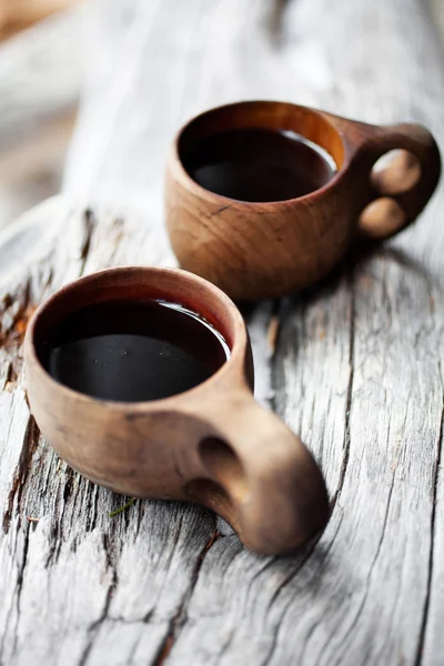 Café servido em copos de madeira — Fotografia de Stock