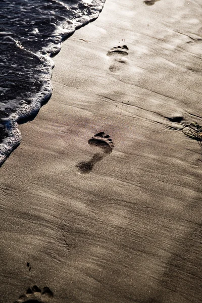 Human Footprints on sand — Stock Photo, Image