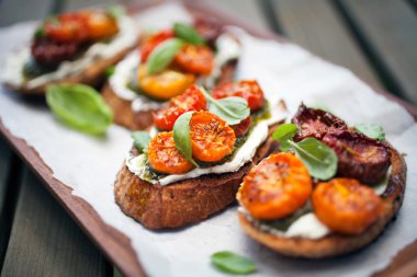 Bruschettas with half dried tomatoes