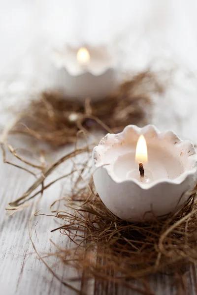 Easter eggs shell candles — Stock Photo, Image