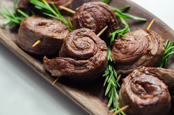 Juicy beef, fried and cooked in the shape of a rose, creatively served meat, meat flower