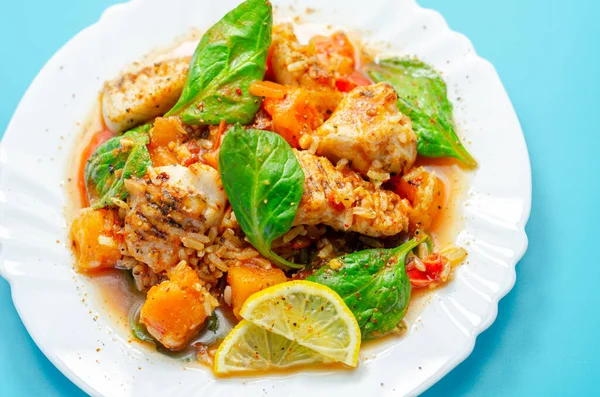 Chicken Jambalaya, cooked chicken breast pieces, in a spiced tomato sauce with chorizo, wholegrain rice, baby spinach, diced butternut squash and sliced red peppers, creole cuisine