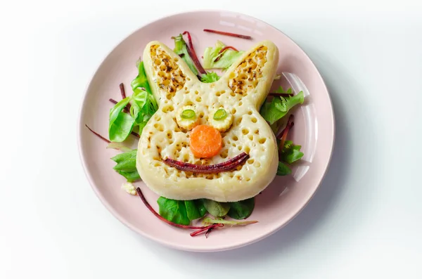 Funny and nice bunny shaped crumpets served with mix fresh vegetables, funny food for kids, healthy food