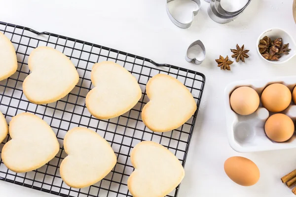 Baking heart shaped sugar cookies