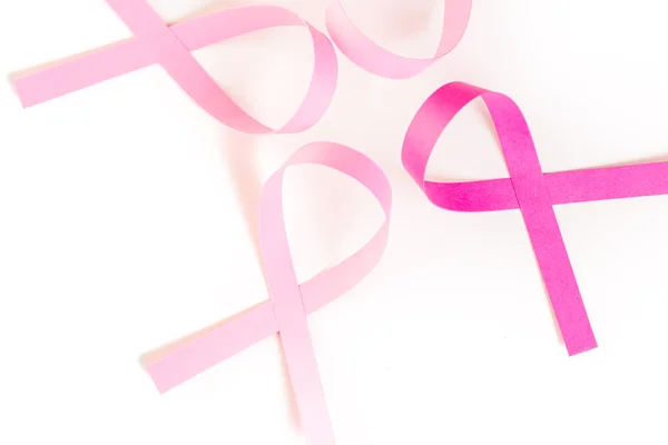 Womens health symbol in pink ribbon — Stock Photo, Image