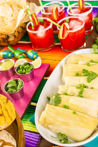 Tamales, strawberry margaritas and pan dulche bread — стоковое фото