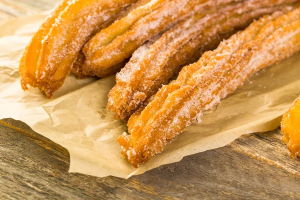 Churros with granulated sugar — Stock Photo, Image