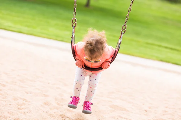 Toddler playing at the playground — Stock Photo, Image