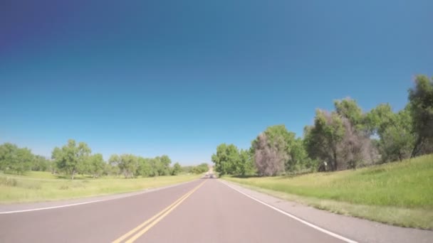 Car driving through campground with motorhomes — Stock Video