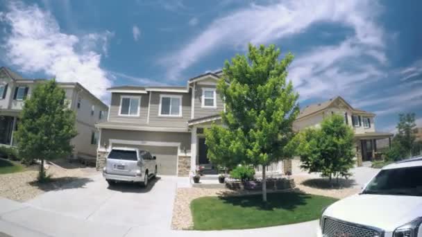 Car driving through residential neighborhood — Stock Footage Car driving through residential neighborhood Video Clip