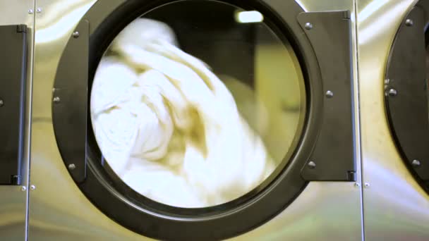 Industrial washing machines in a public laundromat. — Stock Video