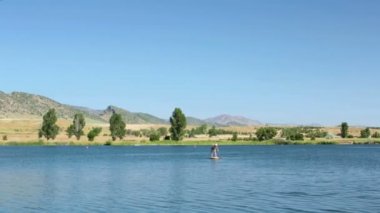 öğrenme kadın nasıl yapılır paddleboard 