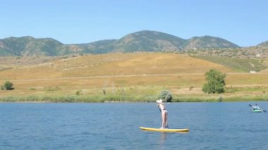 öğrenme kadın nasıl yapılır paddleboard 