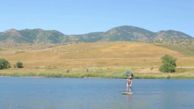 öğrenme kadın nasıl yapılır paddleboard 