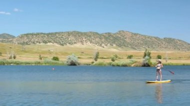 öğrenme kadın nasıl yapılır paddleboard 